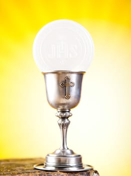 Holy of communion, bright background, saturated concept