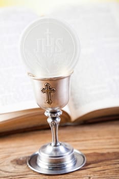 Holy Communion Bread, Wine, bright background, saturated concept
