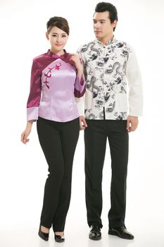 Wearing Chinese clothing waiter in front of a white background