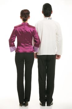 Wearing Chinese clothing waiter in front of a white background