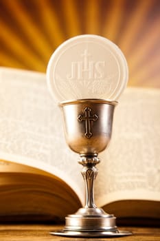 First communion, bright background, saturated concept
