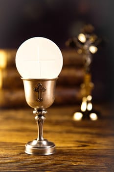 First communion, bright background, saturated concept