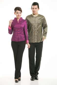 Wearing Chinese clothing waiter in front of a white background