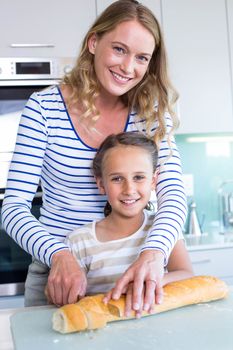 Happy family preparing lunch together at home in the kitchen