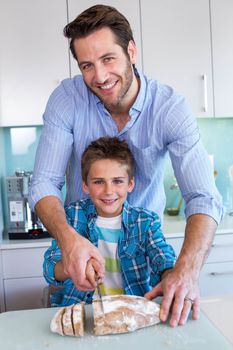 Happy family preparing lunch together at home in the kitchen