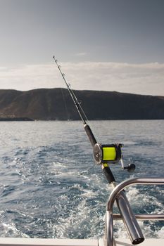 fishing rod on a motor boat yacht