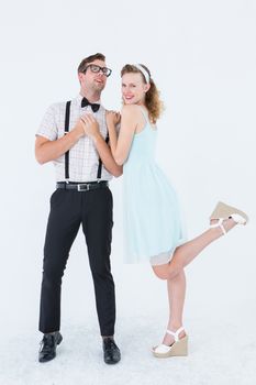 Hipster couple having fun together on white background