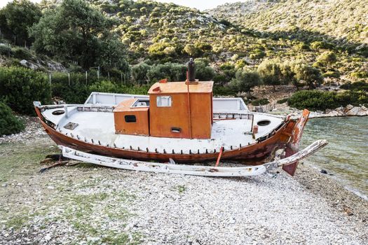 Abandoned fishing trawler on beach at Alonissos, Greece