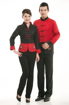 Wearing Chinese clothing waiter in front of a white background