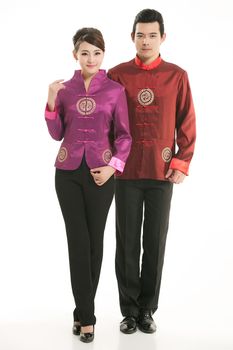 Wearing Chinese clothing waiter in front of a white background