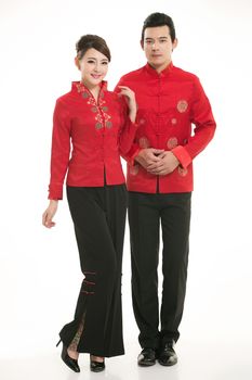 Wearing Chinese clothing waiter in front of a white background