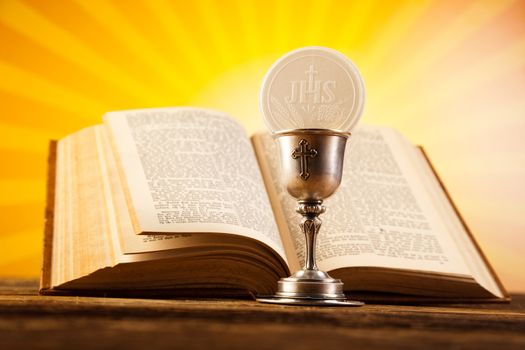 First communion, bright background, saturated concept
