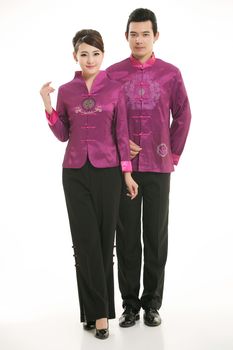 Wearing Chinese clothing waiter in front of a white background