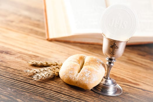 First communion, bright background, saturated concept