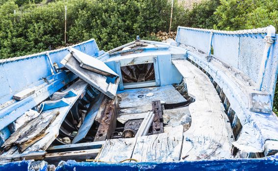 Abandoned fishing boat on beach at Alonissos, Greece