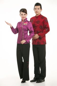 Wearing Chinese clothing waiter in front of a white background