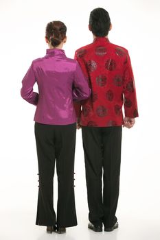 Wearing Chinese clothing waiter in front of a white background