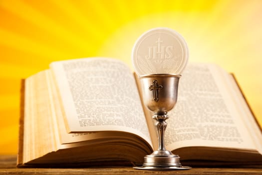 First communion, bright background, saturated concept