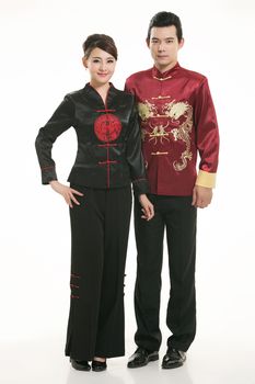 Wearing Chinese clothing waiter in front of a white background