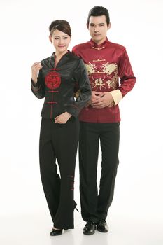 Wearing Chinese clothing waiter in front of a white background