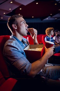 People watching a film at the cinema 