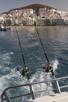 fishing rods on a motorboat yacht