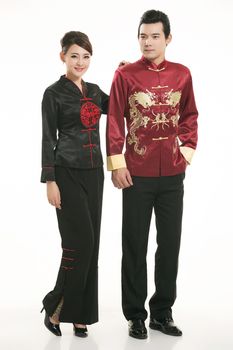 Wearing Chinese clothing waiter in front of a white background