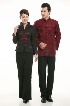 Wearing Chinese clothing waiter in front of a white background