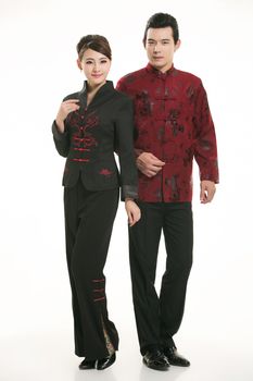 Wearing Chinese clothing waiter in front of a white background