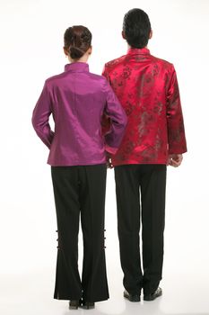 Wearing Chinese clothing waiter in front of a white background