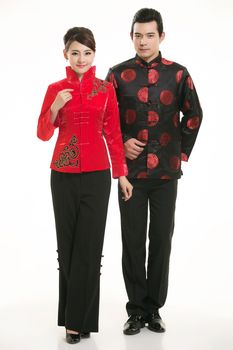 Wearing Chinese clothing waiter in front of a white background