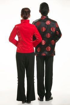 Wearing Chinese clothing waiter in front of a white background