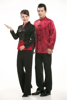 Wearing Chinese clothing waiter in front of a white background