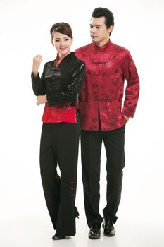 Wearing Chinese clothing waiter in front of a white background