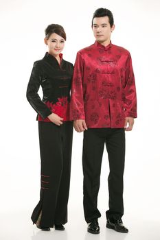 Wearing Chinese clothing waiter in front of a white background