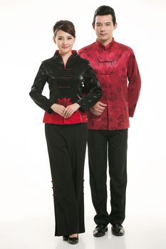 Wearing Chinese clothing waiter in front of a white background