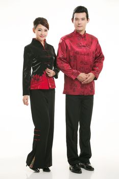 Wearing Chinese clothing waiter in front of a white background