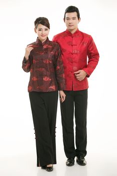 Wearing Chinese clothing waiter in front of a white background