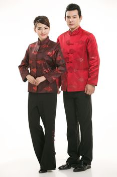 Wearing Chinese clothing waiter in front of a white background