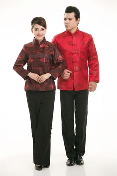 Wearing Chinese clothing waiter in front of a white background