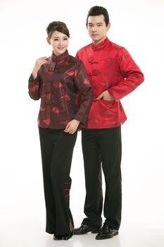 Wearing Chinese clothing waiter in front of a white background