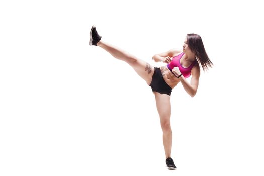 Fitness girl. Sexy athletic woman in a fighting pose