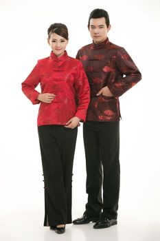 Wearing Chinese clothing waiter in front of a white background