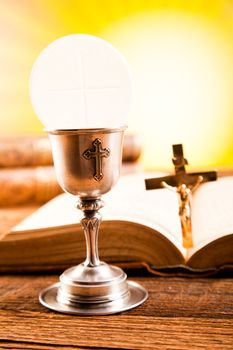 Communion wafer, bright background, saturated concept