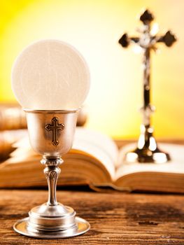 Communion wafer, bright background, saturated concept
