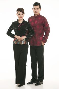 Wearing Chinese clothing waiter in front of a white background