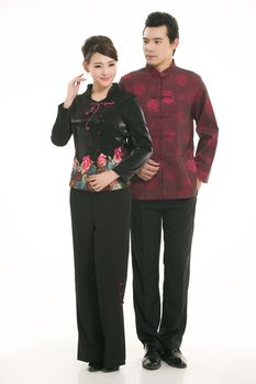 Wearing Chinese clothing waiter in front of a white background