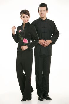 Wearing Chinese clothing waiter in front of a white background