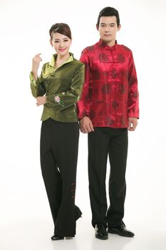 Wearing Chinese clothing waiter in front of a white background