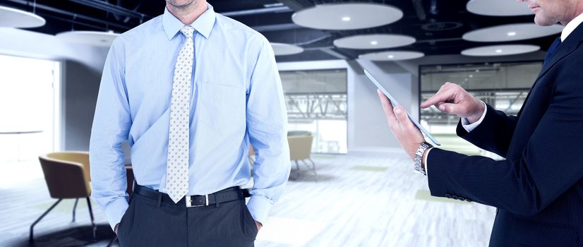 Businessman looking at the camera against college